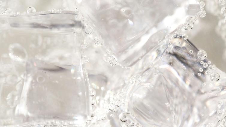 Ice cubes in a carbonated beverages