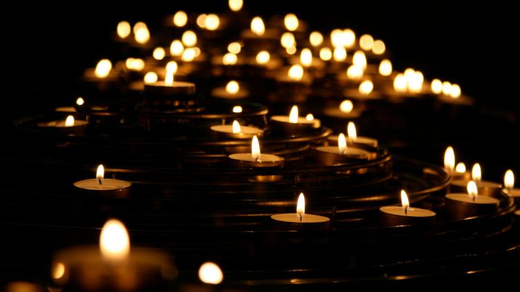 Tea light candles in a dark space